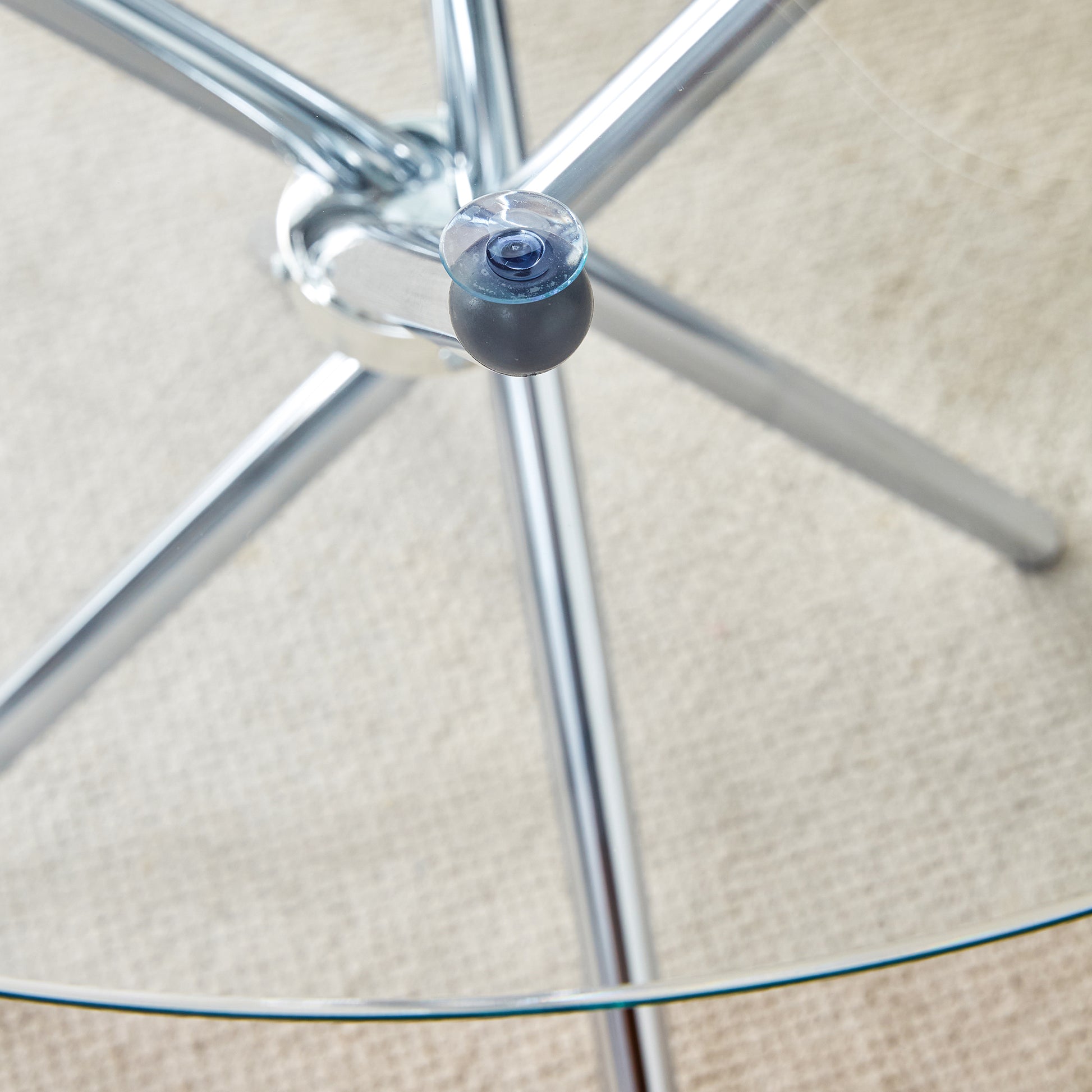 Table And Chair Set.36.6"Round Clear Glass Dining Table With A Unique Shape With Ring Shaped Gathered Silver Metal Legs.Paired With 4 Dark Gray High Quality Pu Dining Chairs With Silver Metal Legs.