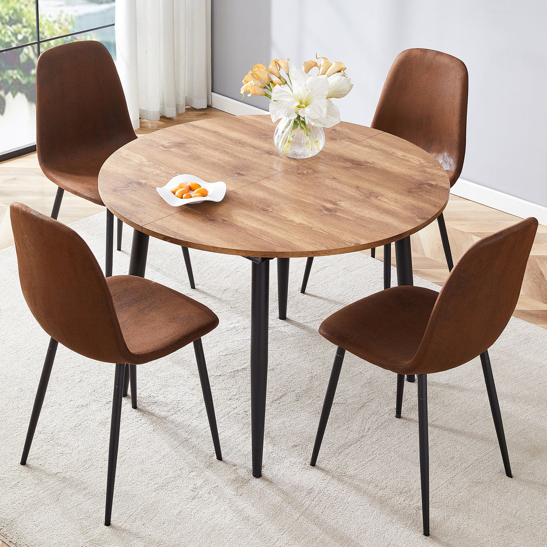 Table And Chair Set.Modern Extendable Mdf Dining Table.The Table Has A Telescopic Design, Suitable For Gatherings Of Different Size.Paired With 4 Chairs With Soft Suede Cushions And Black Metal