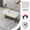 Table And Chair Set.The Table Has A Glass Top With Imitation Marble Pattern Stickers And Stainless Steel Golden Legs. Paried With Chairs With Pu Artificial Leather Backrest Cushions And Black Legs. White Gold Seats 6 Glass Metal