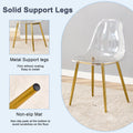 A Modern Minimalist Style Round Transparent Tempered Glass Table With Gold Metal Legs,Paired With 4 Modern Style Transparent Dining Chairs For A Luxurious Experience. Transparent Seats 4 Glass