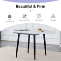 Table And Chair Set.Modern Extendable Mdf Dining Table.The Table Has A Telescopic Design, Suitable For Gatherings Of Different Size.Paired With 4 Chairs With Pu Cushions And Black Metal Legs. White Black Seats 4 Mdf Metal