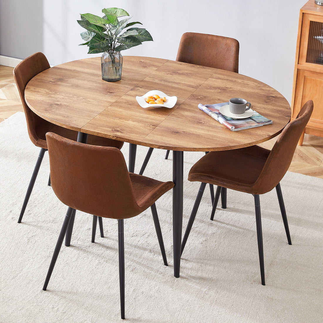 Table And Chair Set.Modern Extendable Mdf Dining Table.The Table Has A Telescopic Design, Suitable For Gatherings Of Different Size.Paired With 4 Chairs With Soft Suede Cushions And Black Metal