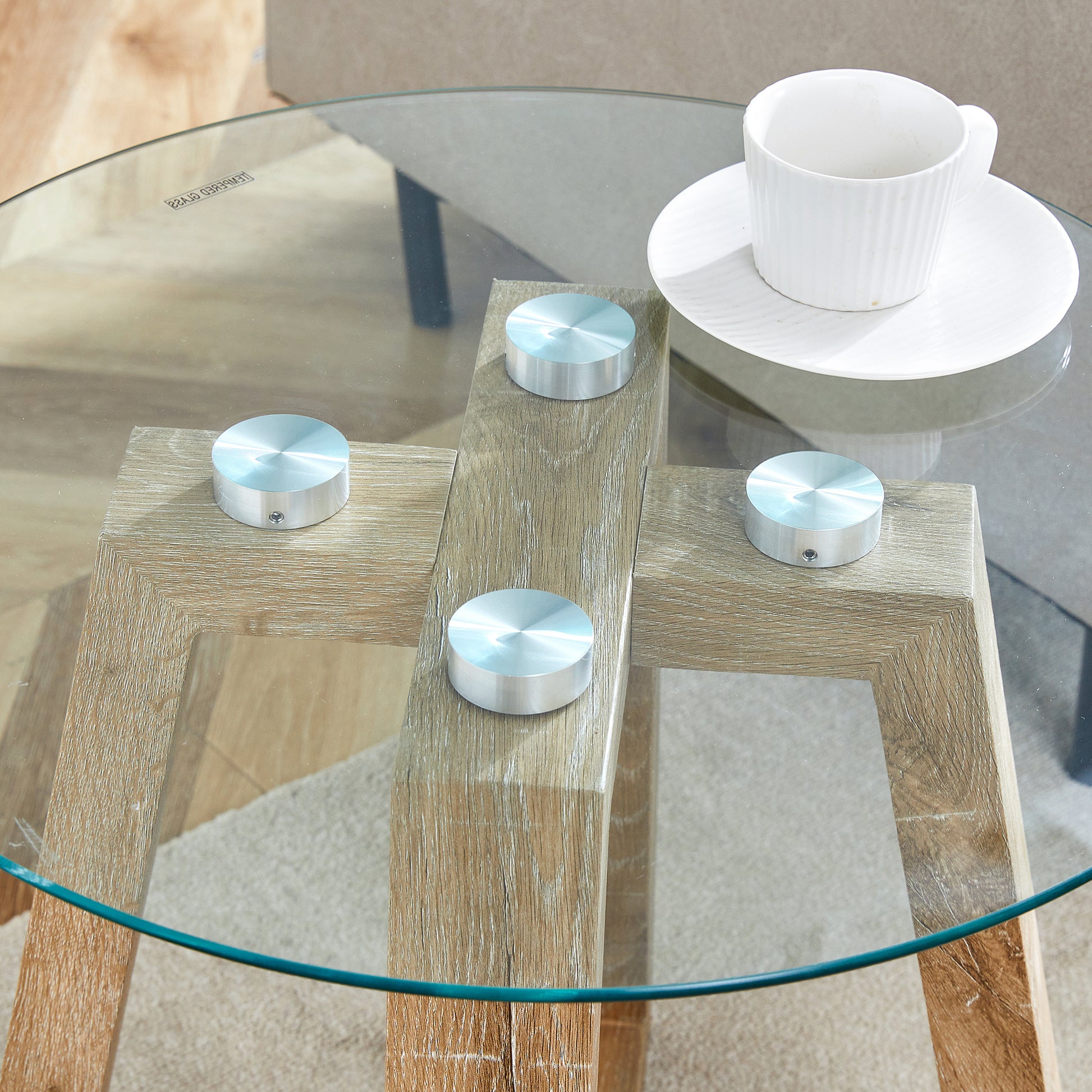 Modern And Practical Round Table. Made Of Clear Tempered Glass Top And Wood Coloured Mdf Material. Suitable For Living Rooms And Bedrooms. Wood Mdf Glass