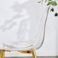 A Modern Minimalist Style Round Transparent Tempered Glass Table With Gold Metal Legs, Paired With 4 Modern Style Transparent Dining Chairs For A Luxurious Experience. Transparent Seats 4 Glass