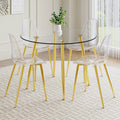 A Modern Minimalist Style Round Transparent Tempered Glass Table With Gold Metal Legs, Paired With 4 Modern Style Transparent Dining Chairs For A Luxurious Experience. Transparent Seats 4 Glass