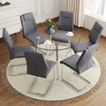 Table And Chair Set.A Modern Minimalist Round Dining Table With Transparent Tempered Glass Top And Silver Metal Legs,And 6 Chairs With Pu Backrest And Seat Cushion And Silver C Tube Metal Legs. Dark Gray,Transparent Seats 6 Glass Metal