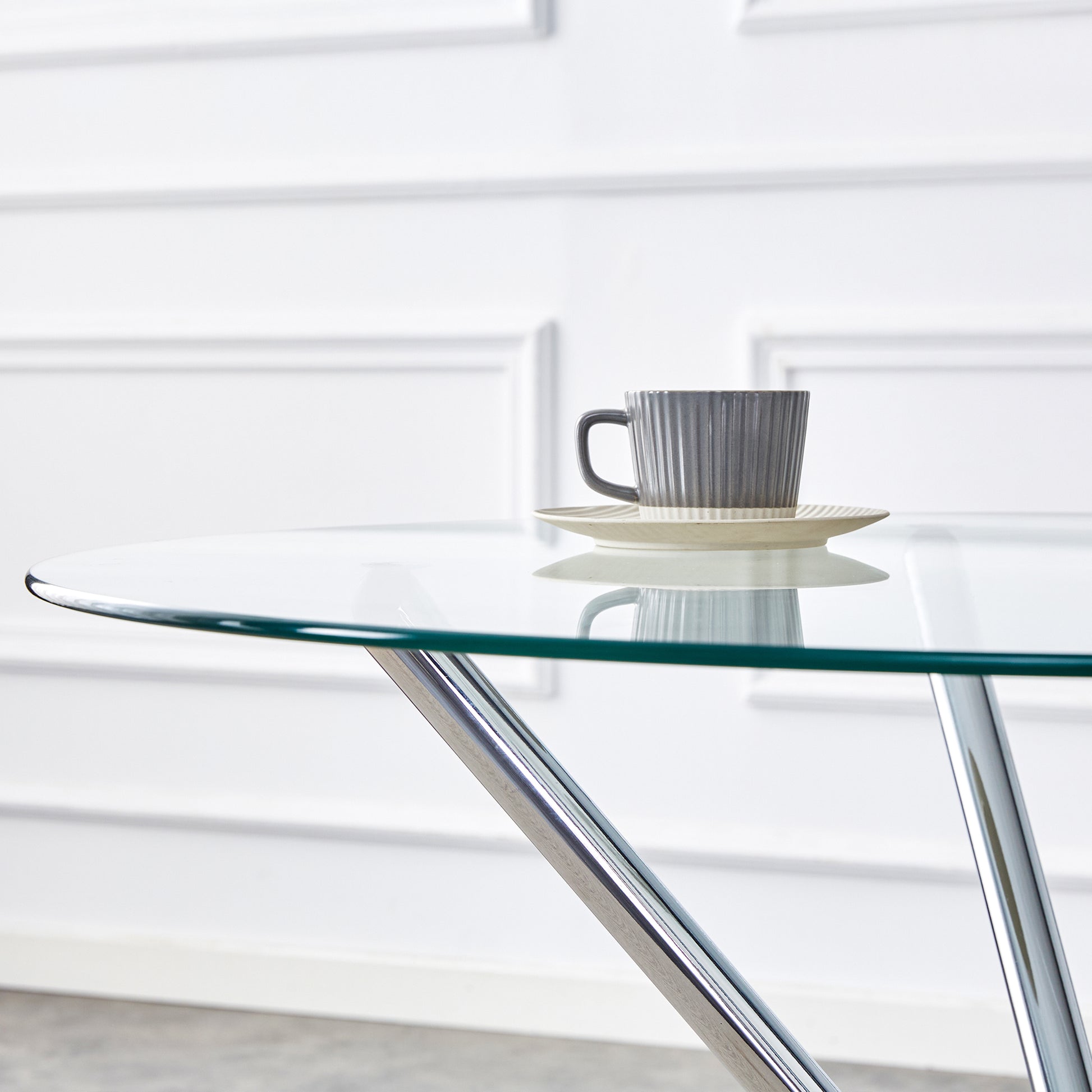 Table And Chair Set.36.6"Round Clear Glass Dining Table With A Unique Shape With Ring Shaped Gathered Silver Metal Legs.Paired With 4 Black High Quality Pu Dining Chairs With Silver Metal Legs.