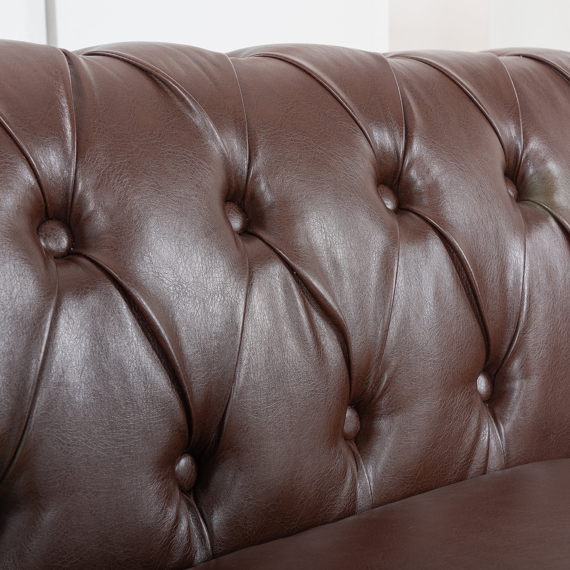 84.65" Dark Brown Pu Rolled Arm Chesterfield Three Seater Sofa. Dark Brown Foam Pu