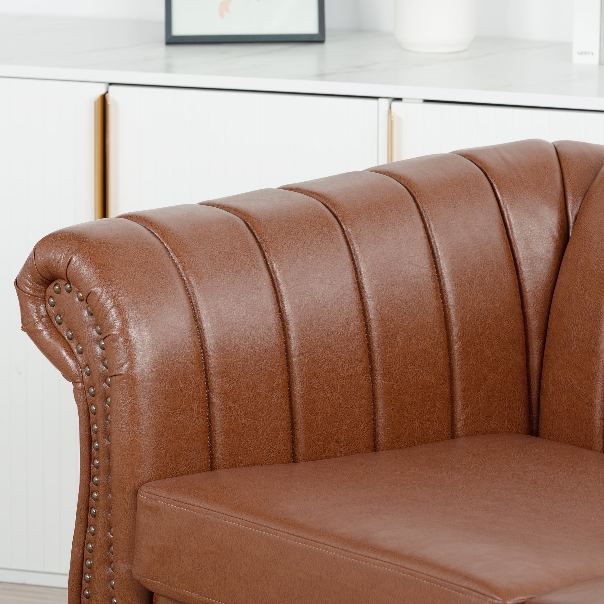 83.46" Brown Pu Rolled Arm Chesterfield Three Seater Sofa. Brown Pu
