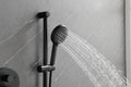 Shower System With Shower Head, Hand Shower, Slide Bar, Bodysprays, Shower Arm, Hose, Valve Trim, And Lever Handles Matte Black Brass