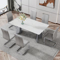Modern Minimalist Dining Table. The White Imitation Marble Glass Desktop Is Equipped With Silver Metal Legs. Suitable For Restaurants And Living Rooms 71