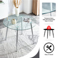 Table And Chair Set. 1 Table 4 Gray Chairs Round Dining Table With A 40 Inch Diameter Glass Tabletop And Silver Plated Metal Legs. 4 Gray Pu Chairs Dt 1164 001 Transparent Glass