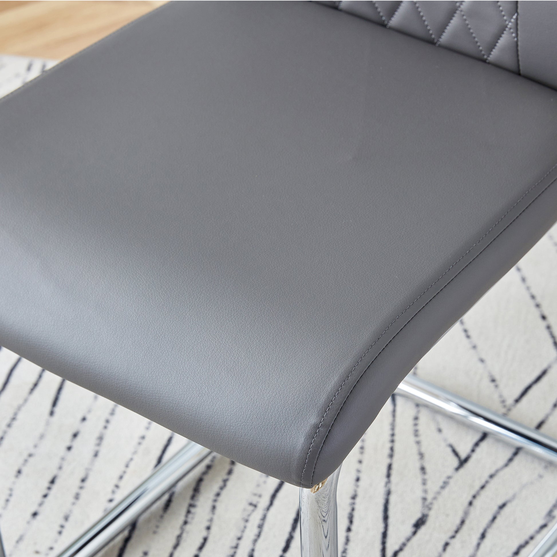 Table And Chair Set. 1 Table 4 Gray Chairs Round Dining Table With A 40 Inch Diameter Glass Tabletop And Silver Plated Metal Legs. 4 Gray Pu Chairs Dt 1164 001 Transparent Seats 4 Glass