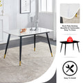Table And Chair Set. White Imitation Marble Patterned Burnt Stone Tabletop With Black Metal Legs. Orange Deep Gray Dual Tone Pu Leather Backrest And Black Metal Leg Chair. 1 Table And 4 Chairs 001 007 White Sintered Stone
