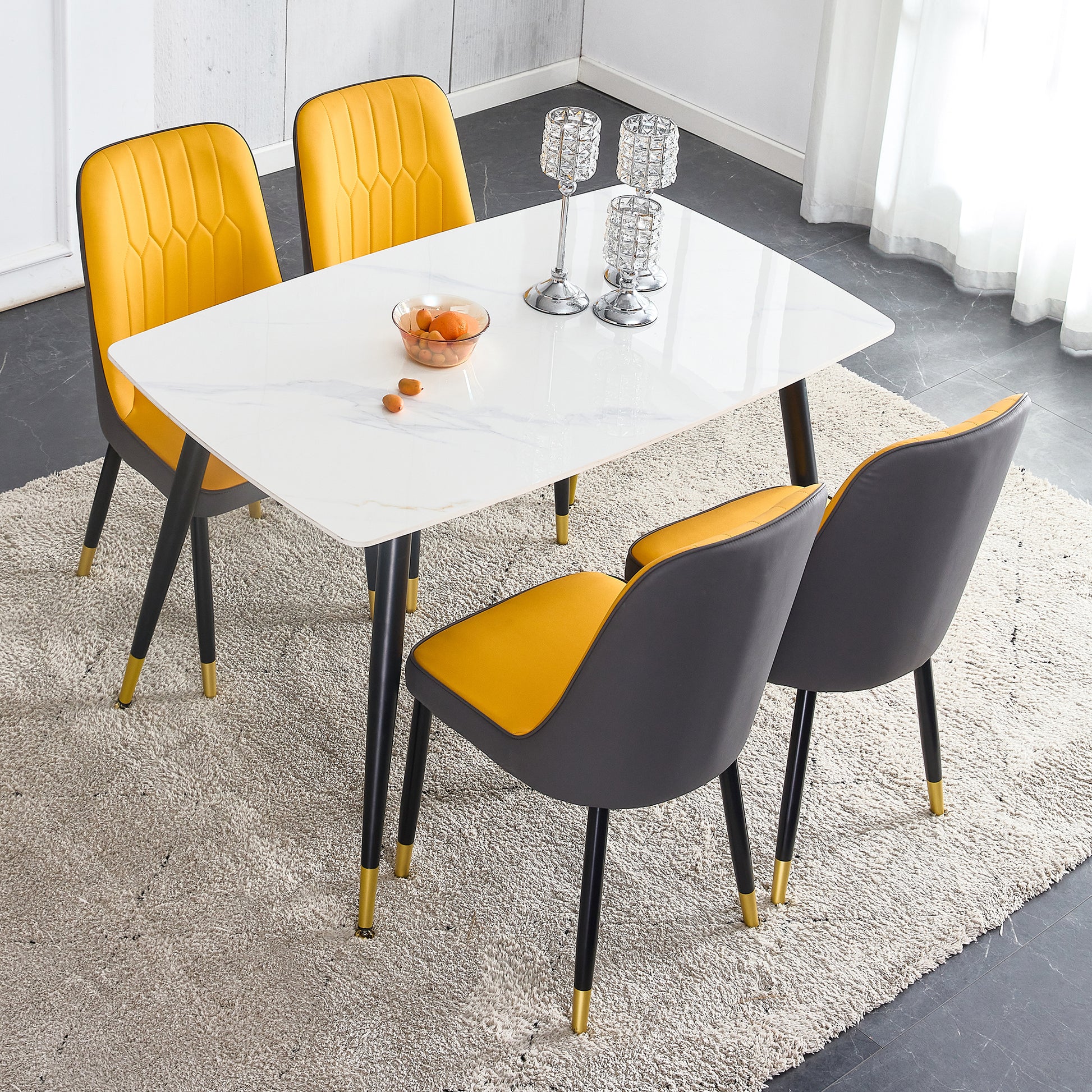 Table And Chair Set. White Imitation Marble Patterned Burnt Stone Tabletop With Black Metal Legs. Orange Deep Gray Dual Tone Pu Leather Backrest And Black Metal Leg Chair. 1 Table And 4 Chairs 001 007 White Sintered Stone