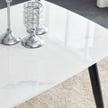 Table And Chair Set. White Imitation Marble Patterned Burnt Stone Tabletop With Black Metal Legs. Orange Deep Gray Dual Tone Pu Leather Backrest And Black Metal Leg Chair. 1 Table And 4 Chairs 001 007 White Sintered Stone