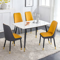 Table And Chair Set. White Imitation Marble Patterned Burnt Stone Tabletop With Black Metal Legs. Orange Deep Gray Dual Tone Pu Leather Backrest And Black Metal Leg Chair. 1 Table And 4 Chairs 001 007 White Sintered Stone
