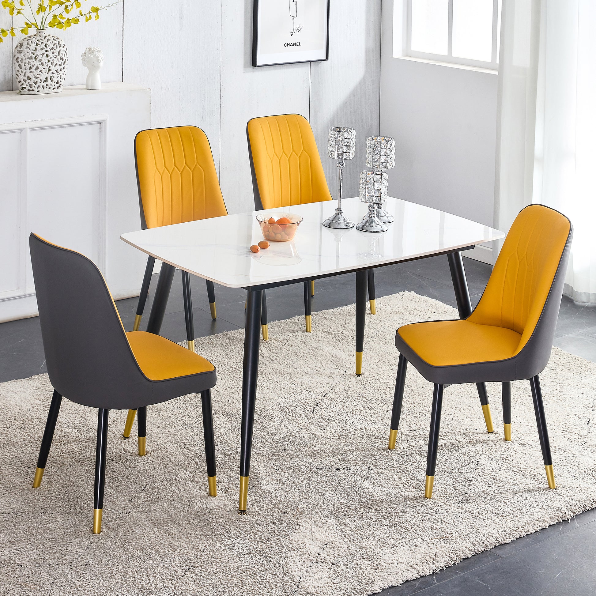 Table And Chair Set. White Imitation Marble Patterned Burnt Stone Tabletop With Black Metal Legs. Orange Deep Gray Dual Tone Pu Leather Backrest And Black Metal Leg Chair. 1 Table And 4 Chairs 001 007 White Sintered Stone