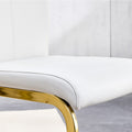 Table And Chair Set. 1 Table And 4 White Pu Backrest Cushions With Gold Metal Leg Chairs . A Rectangular White Imitation Marble Desktop With Mdf Legs And Gold Metal Decorative Strips. Hh1162 White Mdf Glass