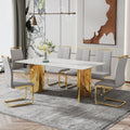 Modern Minimalist Dining Table. The White Imitation Marble Glass Desktop Is Equipped With Golden Metal Legs. Suitable For Restaurants And Living Rooms 71 