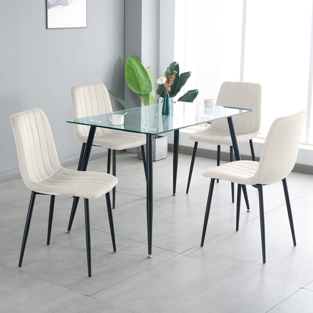 Table And Chair Set, One Table And Four Chairs. Clear Tempered Glass Table Top, 0.3 Feet Thick, Black Wrought Iron Legs. Black Spray Paint Chair Legs. Upholstered Chair Glass Cream White Metal