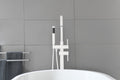 Floor Mount Bathtub Faucet Freestanding Tub Filler Standing High Flow Shower Faucets Shower Mixer Taps Swivel Gooseneck Spout With Cylinder Handheld White Stainless Steel