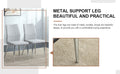 Four Light Gray Dining Chairs. A Medieval Modern Chair Made Of Pu Material With Soft Cushions And Silver Metal Legs. Suitable For Restaurants And Living Rooms Light Gray Pu