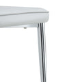 Four Light Gray Dining Chairs. A Medieval Modern Chair Made Of Pu Material With Soft Cushions And Silver Metal Legs. Suitable For Restaurants And Living Rooms Light Gray Pu