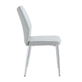 Four Light Gray Dining Chairs. A Medieval Modern Chair Made Of Pu Material With Soft Cushions And Silver Metal Legs. Suitable For Restaurants And Living Rooms Light Gray Pu