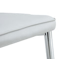 Four Light Gray Dining Chairs. A Medieval Modern Chair Made Of Pu Material With Soft Cushions And Silver Metal Legs. Suitable For Restaurants And Living Rooms Light Gray Pu