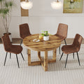 A Modern And Practical Circular Dining Table. Made Of Mdf Tabletop And Wooden Mdf Table Legs.A Set Of 4 Brown Cushioned Chairs In A Modern Medieval Style Restaurant. Ct 403B0502A Natural Wood Mdf