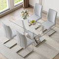 Table And Chair Set.Modern Dining Table,Tempered Glass Tabletop And Silver Colored Leg.Paired With 4 Soft And Comfortable Light Gray Pu Chair, Perfect For Dinner, Meetings, Home And Office Decor.