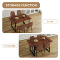 Table And Chair Set. A Minimalist Retro Rectangular Dining Table With A Specially Textured Top And Black Metal Legs, Paired With Soft Chairs And Black Metal Legs, Showcases A Beautiful Home Style. Brown Seats 6 Mdf Metal