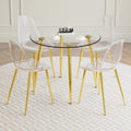 A Modern Minimalist Style Round Transparent Tempered Glass Table With Gold Metal Legs,Paired With 4 Modern Style Transparent Dining Chairs For A Luxurious Experience. Transparent Seats 4 Glass