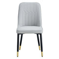 Table And Chair Set.The Table Has A Glass Top With Imitation Marble Pattern Stickers And Stainless Steel Golden Legs. Paried With Chairs With Pu Artificial Leather Backrest Cushions And Black Legs. Black Gold Seats 6 Glass Metal