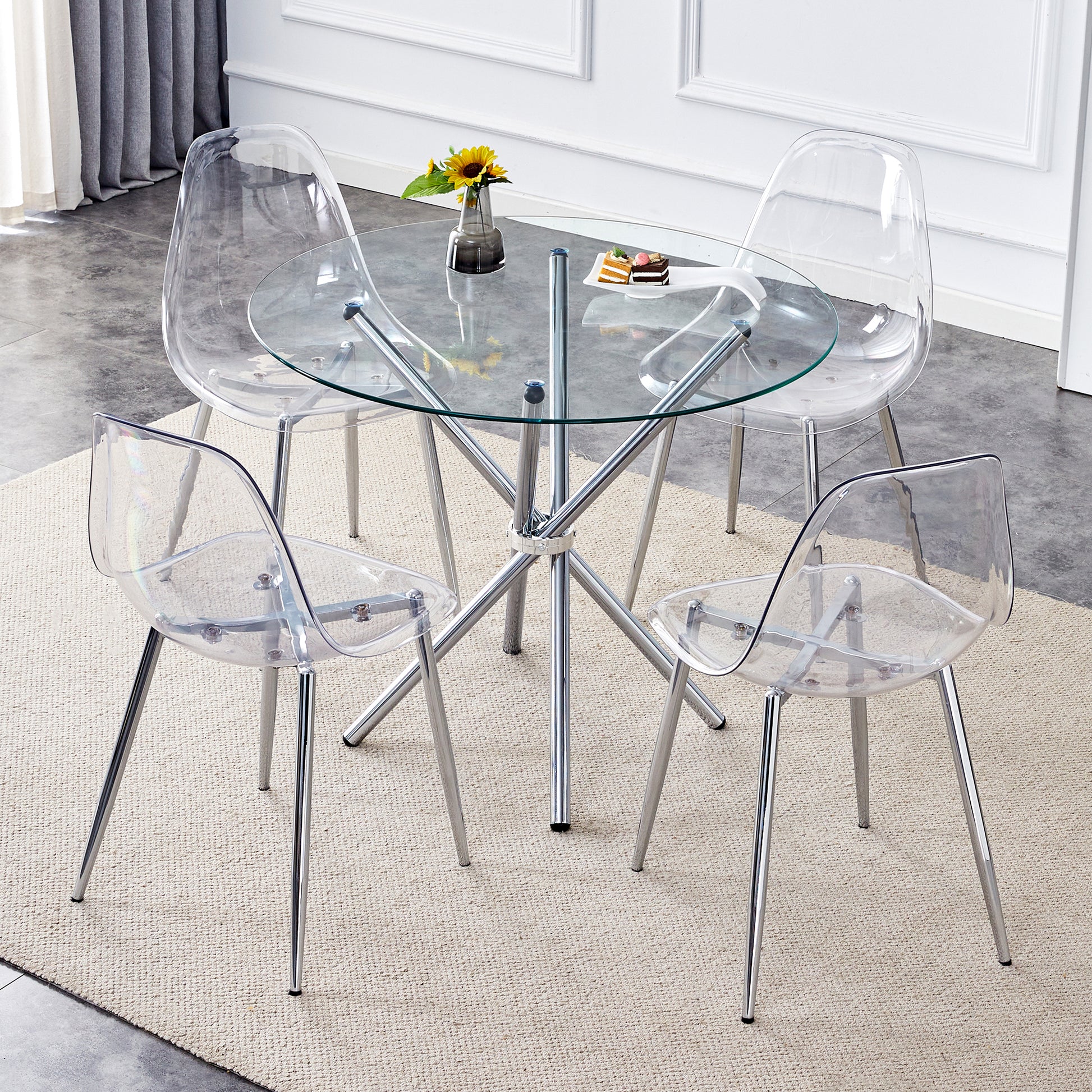 Table And Chair Set.36.6"Round Clear Glass Dining Table With A Unique Shape With Ring Shaped Gathered Silver Metal Legs.Paired With 4 Transparent High Quality Pp Dining Chairs With Silver Legs.