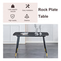 Table And Chair Set. Large Modern Rectangular Table With Black Textured Top And Black Metal Legs. Soft And Comfortable Pu Seats, Faux Leather Upholstered Seats And Sturdy Metal Legs. White Black Seats 4 Sintered Stone