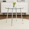 Round Dining Table With Glass Top, Silver Metal Legs, Exquisite Life, Starting From The Details, The Silver Legs Show An Extraordinary Texture, Which Is The Finishing Touch To Your Home Transparent Glass Metal