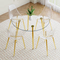 A Modern Minimalist Style Round Transparent Tempered Glass Table With Gold Metal Legs, Paired With 4 Modern Style Transparent Dining Chairs For A Luxurious Experience. Transparent Seats 4 Glass