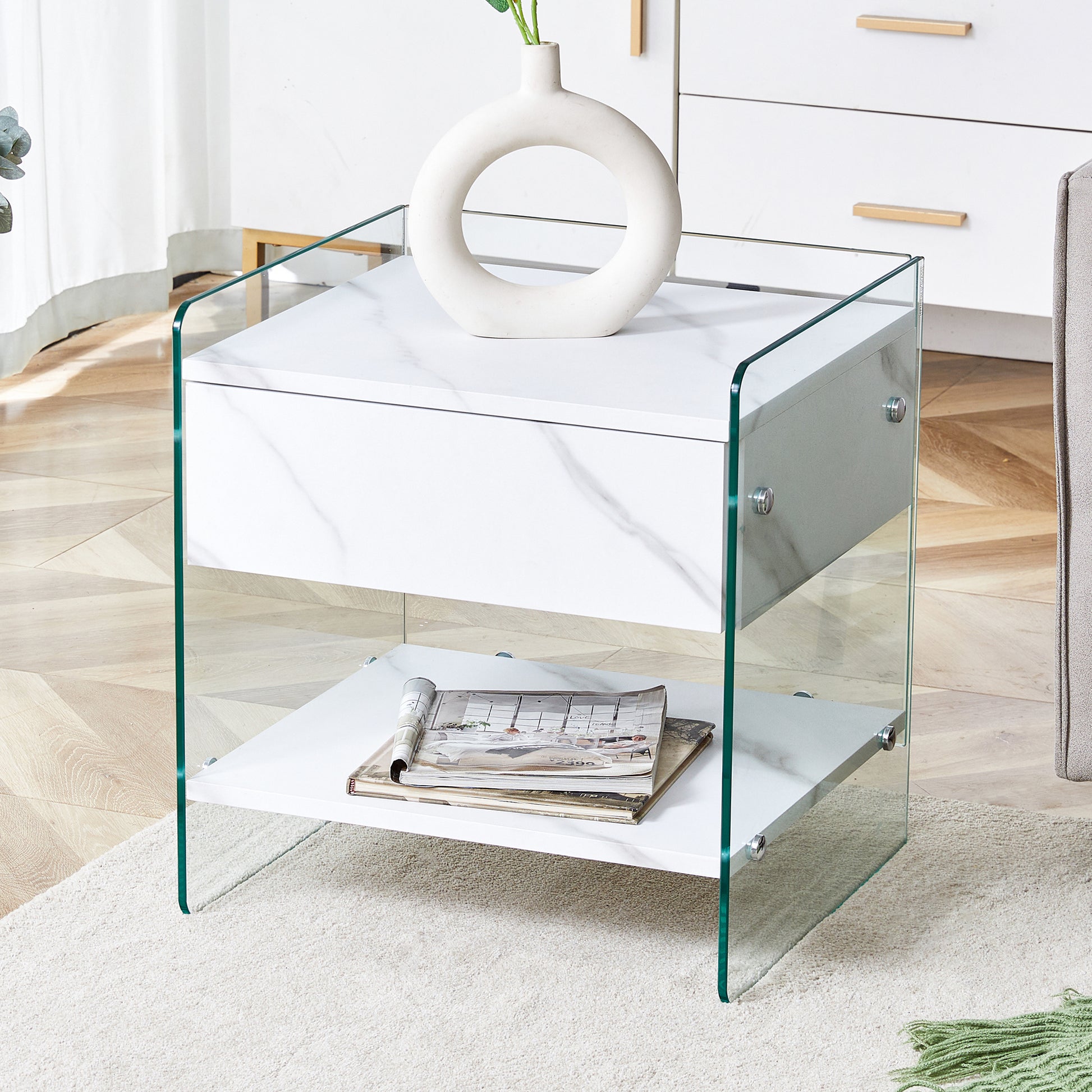 Bedside Table With Drawers. The Board Surface Is Mdf Sticker, And Both Sides Are Transparent Tempered Glass. The Design Is Simple And Elegant, With Excellent Storage Functions. White 1 Drawer Mdf Glass