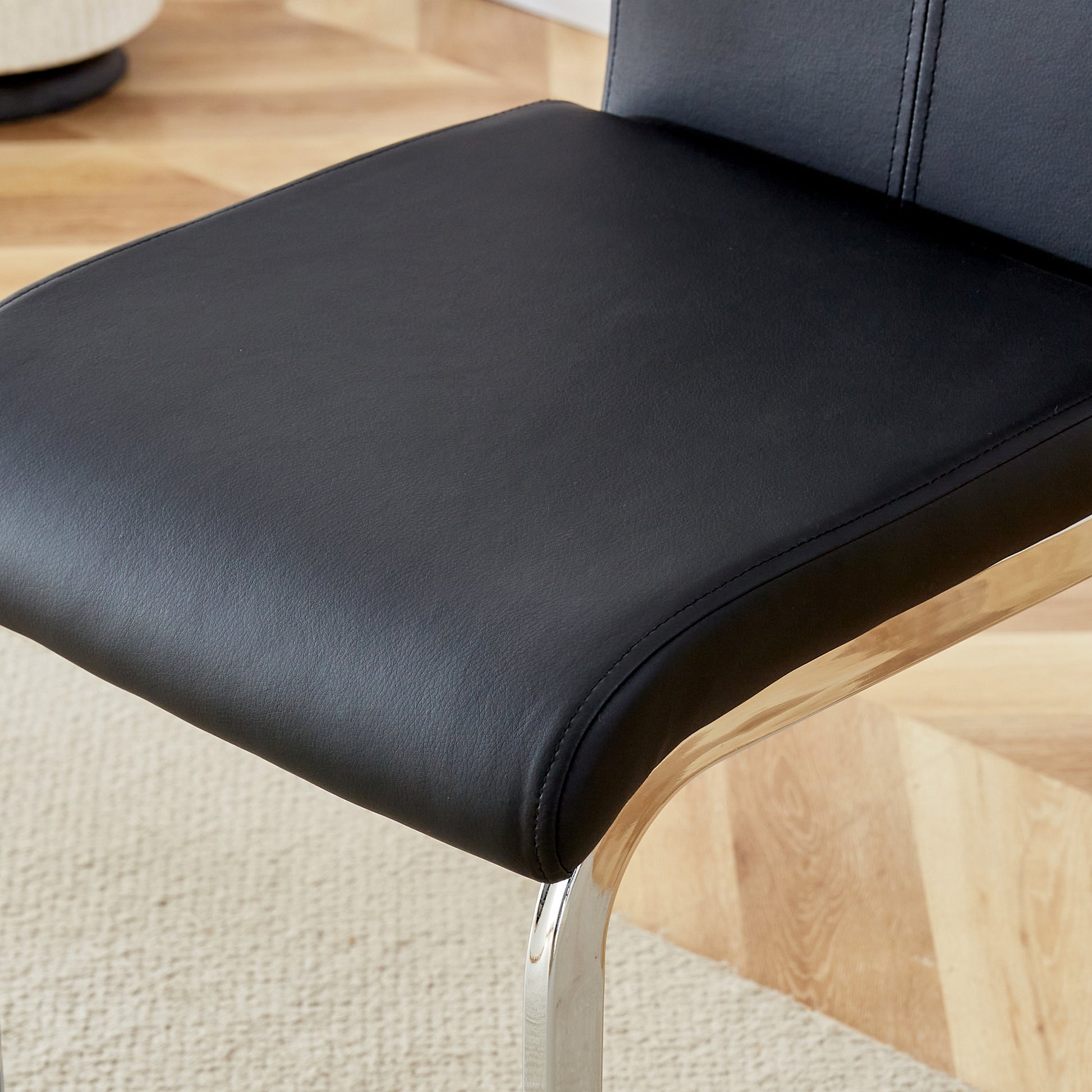 Table And Chair Set. A Rectangular Glass Dining Table With A 0.4 Inch Tempered Glass Tabletop And Mdf Board V Shaped Bracket, Paired With Chairs Consisting Of Pu Seat Cushions And Silver Metal Legs. Black Seats 4 Tempered Glass