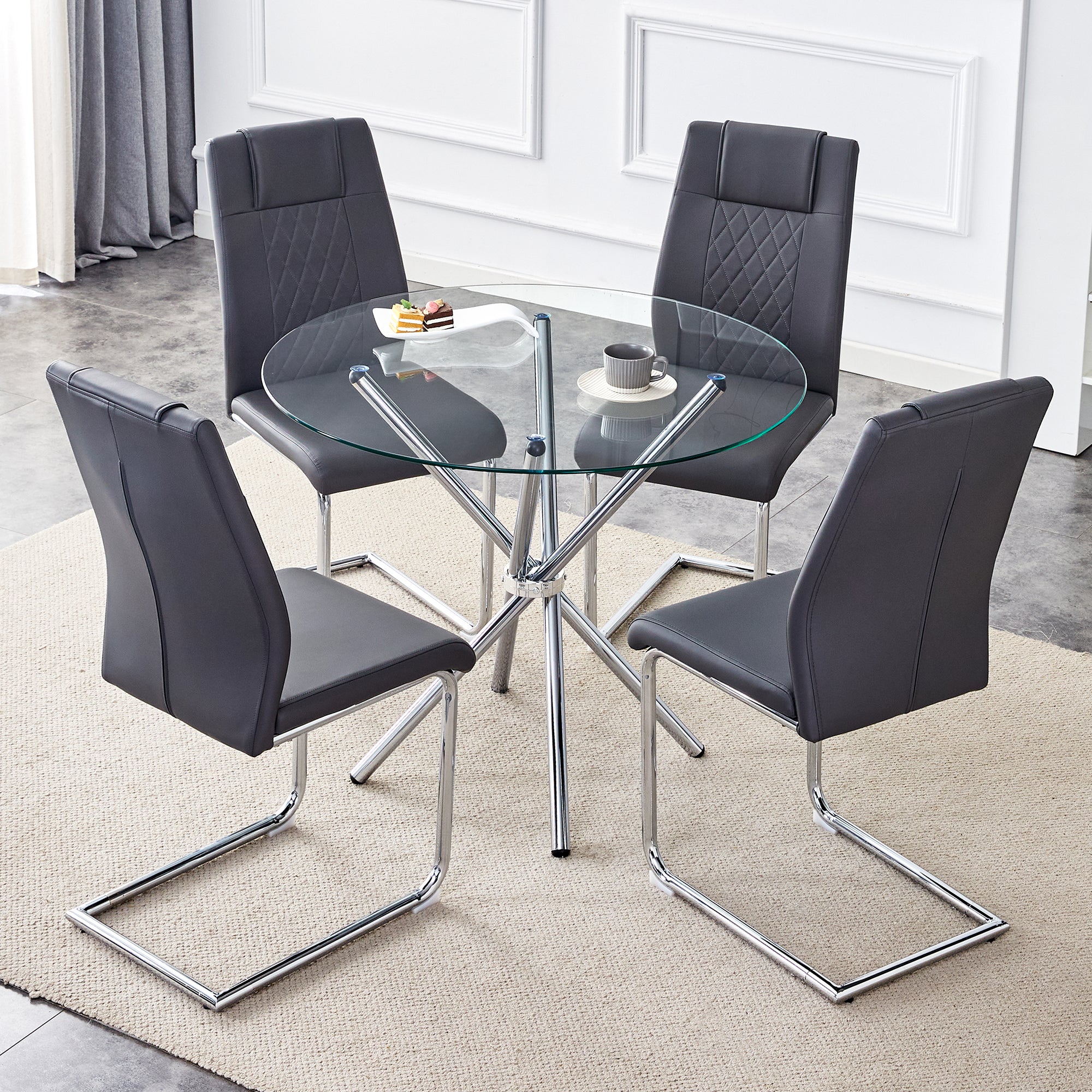 Table And Chair Set.36.6"Round Clear Glass Dining Table With A Unique Shape With Ring Shaped Gathered Silver Metal Legs.Paired With 4 Dark Gray High Quality Pu Dining Chairs With Silver Metal Legs.