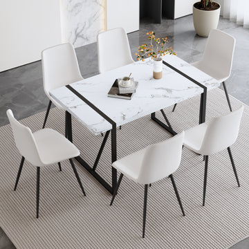 Table And Chair Set.A Modern Minimalist White Marble Veined Mdf Dining Table With Metal Frame.Paried With 6 Chairs With Pu Cushions And Black Metal Legs. White Seats 6 Mdf Metal