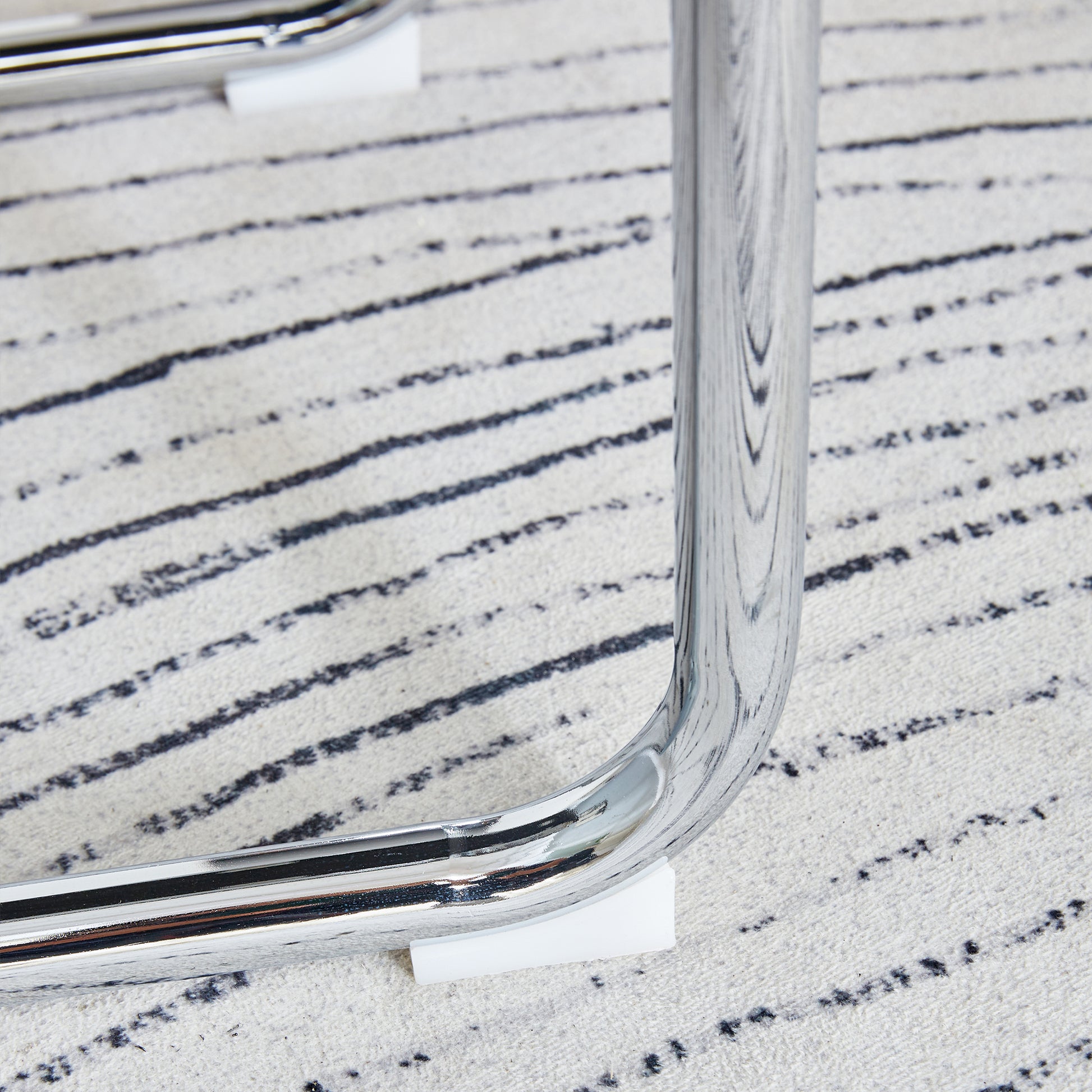 Table And Chair Set.36.6"Round Clear Glass Dining Table With A Unique Shape With Ring Shaped Gathered Silver Metal Legs.Paired With 4 Light Gray High Quality Pu Dining Chairs With Silver Metal Legs.