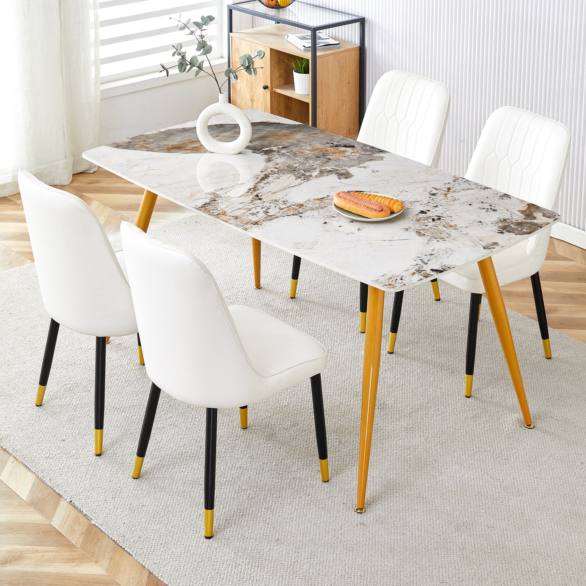 Table And Chair Set.Modern Minimalist Dining Table. White Imitation Marble Pattern Sintered Stone Desktop With Golden Metal Legs.Paried With 4 Comfortable Chairs With Pu Seats And Black Metal Legs.