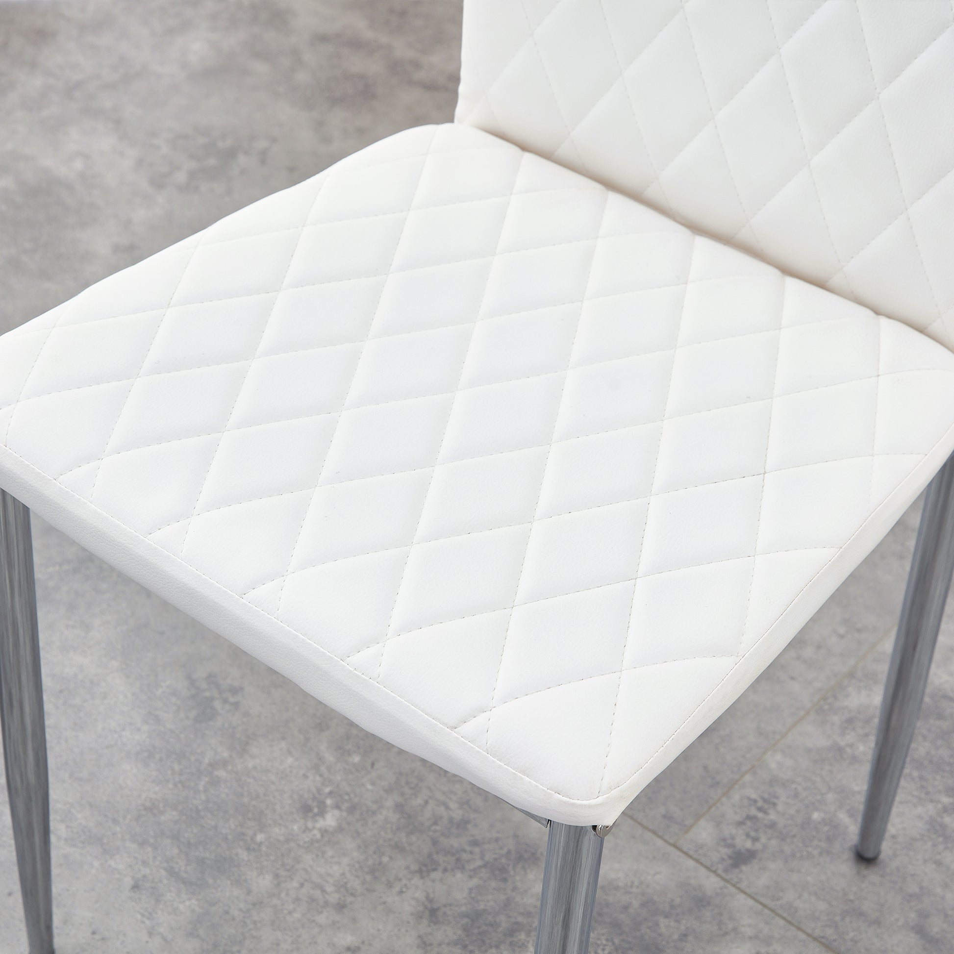 Table And Chair Set.Large Modern Rectangular Table With Brown Glass Top And Silver Metal Legs. Paired With 6 White Chairs With Checkered Armless High Back Pu Cushion And Silver Metal Legs. Silver,White Seats 6 Glass Metal