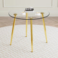 Round Dining Table With Glass Top, Gilded Metal Legs, Exquisite Living, Starting From The Details, The Gold Legs Show An Extraordinary Texture, Which Is The Finishing Touch To Your Home. Transparent Glass Metal