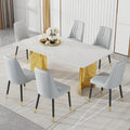 Table And Chair Set.The Table Has A Glass Top With Imitation Marble Pattern Stickers And Stainless Steel Golden Legs. Paried With Chairs With Pu Artificial Leather Backrest Cushions And Black Legs.