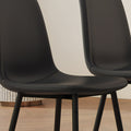 Modern Minimalist Black Dining Chair Set Four Chairs Per Box, Stable And Comfortable.Modern Mid Century Style Upholstered Side Chairs,Spoon Shaped Chairs With Black Metal Legs. Black Metal,Pu