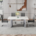 Modern Minimalist Dining Table. Imitation Marble Glass Sticker Desktop, Stainless Steel Legs, Stable And Beautiful. 4 Premium Pu Seats. 63 Inches * 35.4 Inches * 29.5 Inches Dt 69 C 1162 Silver Glass